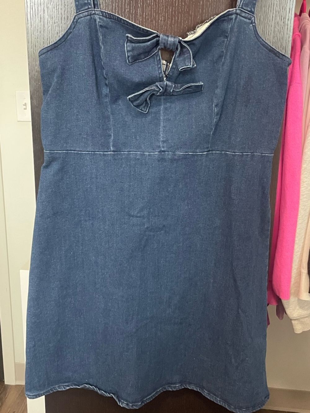 Denim dress with bows on the front